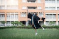 Portrait of happy and excited of young Asian female university graduate wears graduation gown and hat celebrates with degree in Royalty Free Stock Photo