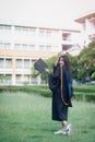 A happy and excited young Asian female university graduate Royalty Free Stock Photo