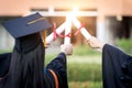 A happy and excited young Asian female university graduate Royalty Free Stock Photo