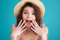 Portrait of a happy excited young woman in beach hat Royalty Free Stock Photo