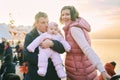 portrait of happy family with adorable baby girl at Christmas market Royalty Free Stock Photo