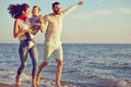 Portrait of happy family and baby enjoying sunset in the summer leisure Royalty Free Stock Photo