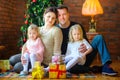 Portrait of a happy family celebrating Christmas at home Royalty Free Stock Photo