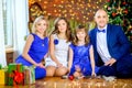 Portrait of a happy family celebrating Christmas at home Royalty Free Stock Photo