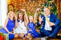 Portrait of a happy family celebrating Christmas at home Royalty Free Stock Photo