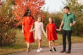 Portrait of happy family of four in autumn Royalty Free Stock Photo