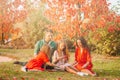 Portrait of happy family of four in autumn Royalty Free Stock Photo