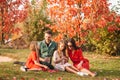 Portrait of happy family of four in autumn day Royalty Free Stock Photo