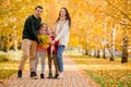 Portrait of happy family of four in autumn day Royalty Free Stock Photo