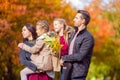 Portrait of happy family of four in autumn day Royalty Free Stock Photo