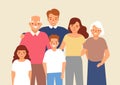 Portrait of happy family with grandfather, grandmother, father, mother, child girl and boy standing together. Cute funny