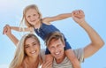 Portrait of a happy family having fun together with copyspace. Young smiling parents enjoying quality time with their Royalty Free Stock Photo