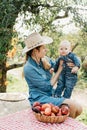 Portrait of Happy family hugging and spending time together outside in green nature. Royalty Free Stock Photo