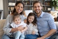 Portrait of happy family with kids relax on couch Royalty Free Stock Photo