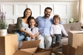Portrait of happy family with kids relocate to new home Royalty Free Stock Photo