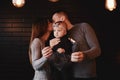 Portrait of happy family, mom, dad and baby girl with sparklers and light. family in anticipation of Christmas. selective photo Royalty Free Stock Photo