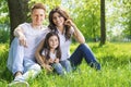 Portrait of happy family in park Royalty Free Stock Photo