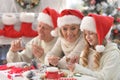 Portrait of happy family preparing for Christmas Royalty Free Stock Photo