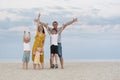 Portrait of happy family on sea beach background. Parents and three children. Family lifestyle Royalty Free Stock Photo