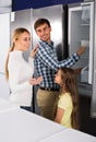 family selecting refrigerator