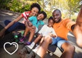 Portrait of happy family sitting on skate board Royalty Free Stock Photo