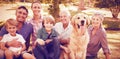 Happy family smiling with dog Royalty Free Stock Photo