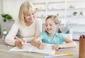 Portrait of happy family spending time at home, drawing Royalty Free Stock Photo