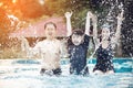 Portrait of happy Family In Swimming Pool. Royalty Free Stock Photo