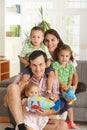 Portrait of happy family with three children Royalty Free Stock Photo