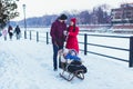 Portrait of happy family during winter walk