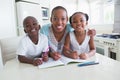 Portrait of a happy family working on the table Royalty Free Stock Photo