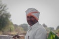 Portrait of happy farmer on agricultural field at latur maharashtra