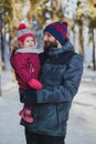 Portrait of happy father and daughter in the winter forest 1 Royalty Free Stock Photo