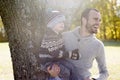 Portrait of happy father son in autumn park Royalty Free Stock Photo