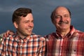 Portrait of happy father and son walking outdoors. Royalty Free Stock Photo