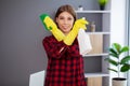 Portrait of happy female cleaner with cleaning equipment in office Royalty Free Stock Photo