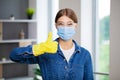 Portrait of happy female cleaner with cleaning equipment in office Royalty Free Stock Photo