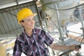Portrait happy female construction worker at site Royalty Free Stock Photo