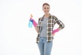 Portrait of happy female doing house duties wearing rubber gloves and holding cleaning equipment. Cheerful look. Hygiene, cleaning Royalty Free Stock Photo