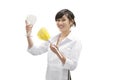 Portrait of a happy female house cleaner dusting glass with feather duster over white background Royalty Free Stock Photo