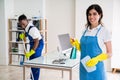 Happy Female Janitor In Office Royalty Free Stock Photo