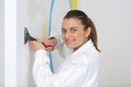 Portrait happy female plasterer painter Royalty Free Stock Photo