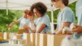 Portrait of a Happy Female Volunteer Preparing Free Food Delivery for Low Income People. Charity Royalty Free Stock Photo