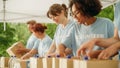 Portrait of a Happy Female Volunteer Preparing Free Food Delivery for Low Income People. Charity Royalty Free Stock Photo