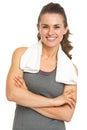 Portrait of happy fitness young woman with towel Royalty Free Stock Photo