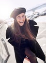 Portrait of happy french woman outdoor