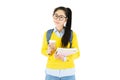 Portrait of a happy friendly casual girl student asian in glasses with backpack holding book and coffee isolated over white Royalty Free Stock Photo