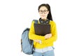 Portrait of a happy friendly casual girl student asian in glasses with backpack holding laptop isolated over white background Royalty Free Stock Photo