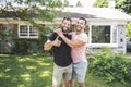 A Portrait of a happy gay couple outdoors in front of a new buy Royalty Free Stock Photo