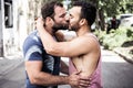 A Portrait of a happy gay couple outdoors in urban background Royalty Free Stock Photo